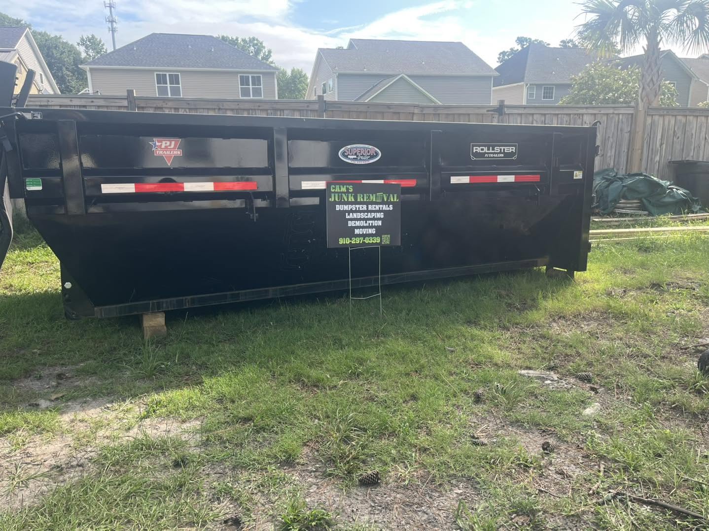 Large roll off dumpster at a clean up or renovation site